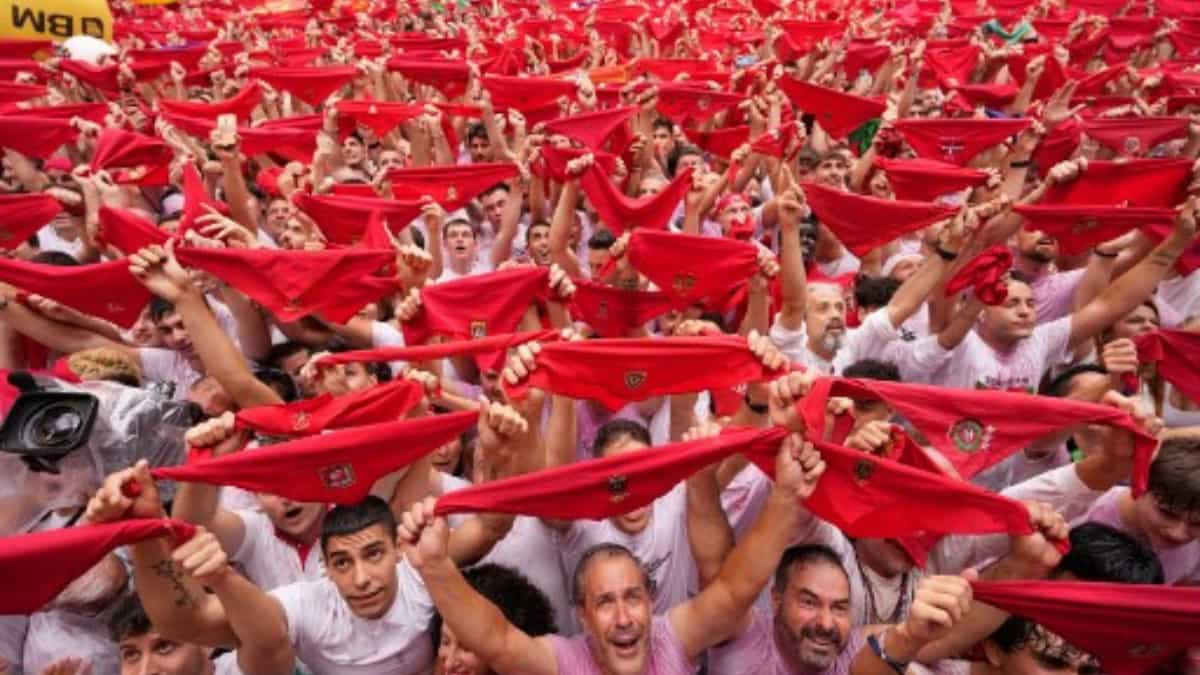 Revelers await the pyrotechnic blast