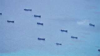 Philippines accuses China of violating its special economic zone with 'swarming' fishing vessels