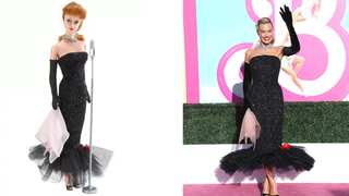 Ditching pink! Margot Robbie dons a 1960s classic black Barbie outfit at the LA premiere
