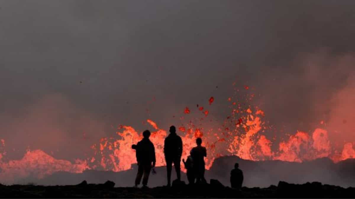 Tourists visit the volcano site