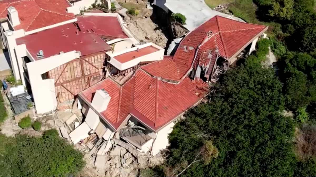Homes slip into the canyon