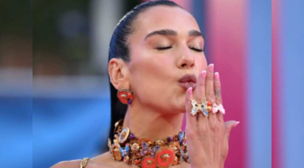Dua Lipa stuns in shimmery gown at Barbie London premiere
