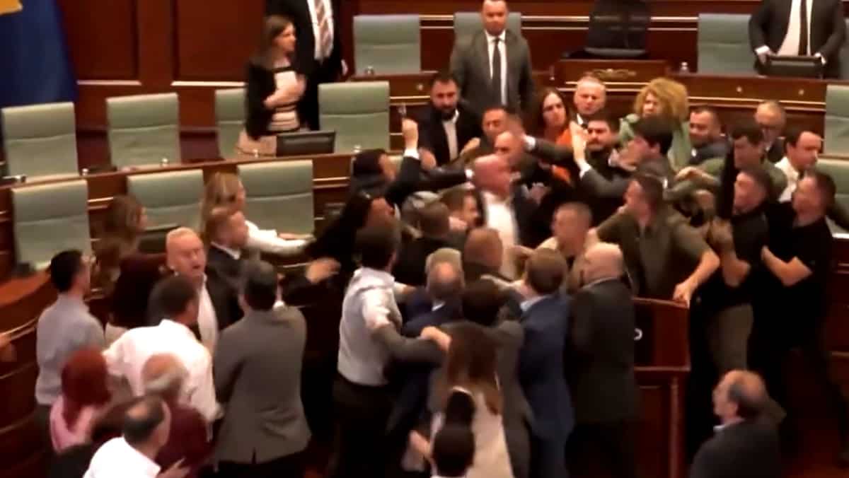 VIDEO: Fistfights erupt, water thrown on Kosovo PM, as heated debate over audio recording turns chaotic