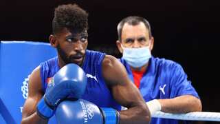 Olympic golf medalist Andy Cruz wins on pro boxing debut