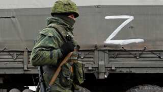 MI6 chief urges Russians 'appalled' by war to 'join hands with us'