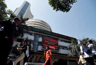 Indian equity indices end at record highs; Sensex closes at lifetime high of 67,097