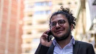 Egypt's president grants pardon to human rights researcher arrested for spreading 'false news'