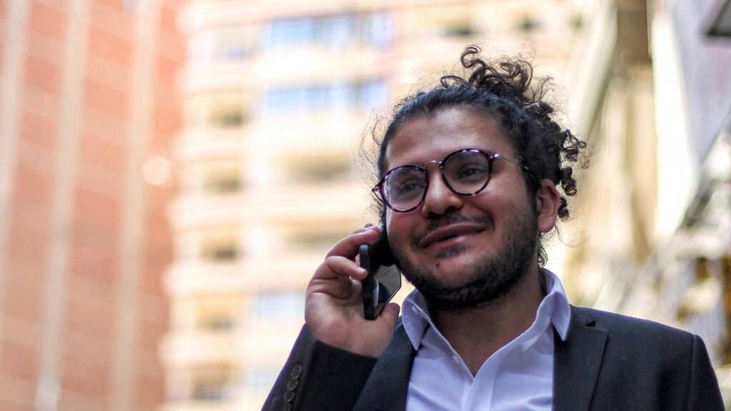 Egypt's president grants pardon to human rights researcher arrested for spreading 'false news'