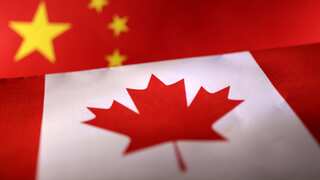 Canada charges retired police officer for illegally aiding China
