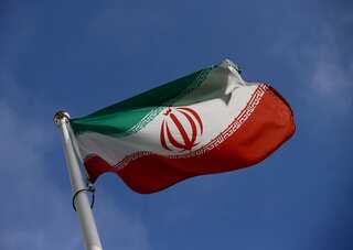 Iran bans film festival that put out poster of actress without hijab