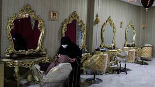Afghan women lose another safe space as Taliban's beauty salon ban comes into force