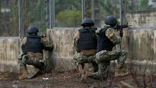Ecuador forces wrest back control of prison as riot death toll climbs to 31