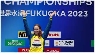 Swimming: Australia's Mollie O'Callaghan defends 100m freestyle title at world championships