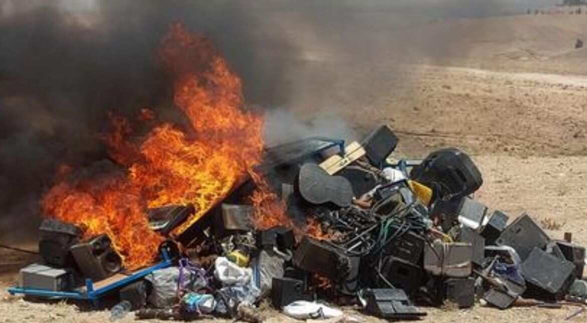 Taliban officials burn dozens of instruments in bonfire