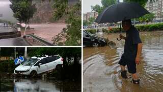 Roads turn into rivers as torrential rains and floods slam Beijing