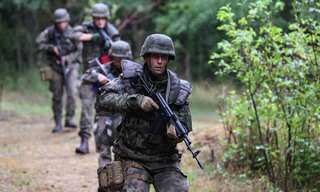 Poland rushes more troops to east after accusing Belarus of intrusion 
