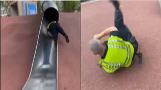Watch: Boston cop takes wild ride down long metal slide, becomes internet sensation