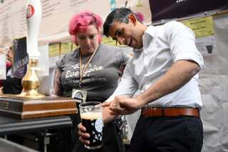 'Oh the irony you're raising alcohol duty...': UK PM Sunak heckled while pouring a pint at beer festival