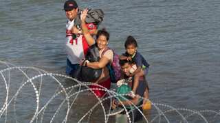 Dead body of a migrant found stuck to 'floating barriers' installed on Rio Grande river