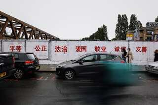 Graffiti war breaks out at London’s Brick Lane over China slogans  