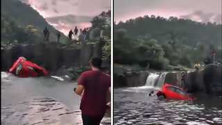 WATCH | India: Father-daughter duo saved from drowning by fellow picnickers after car plunges into waterfall