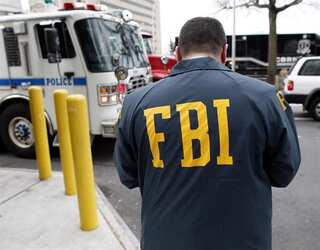 Around 100 arrested in global child abuse probe after murder of two FBI agents