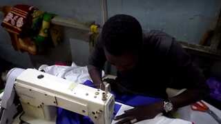 Niger coup: This tailor in Niamey is busy sewing Russian flags