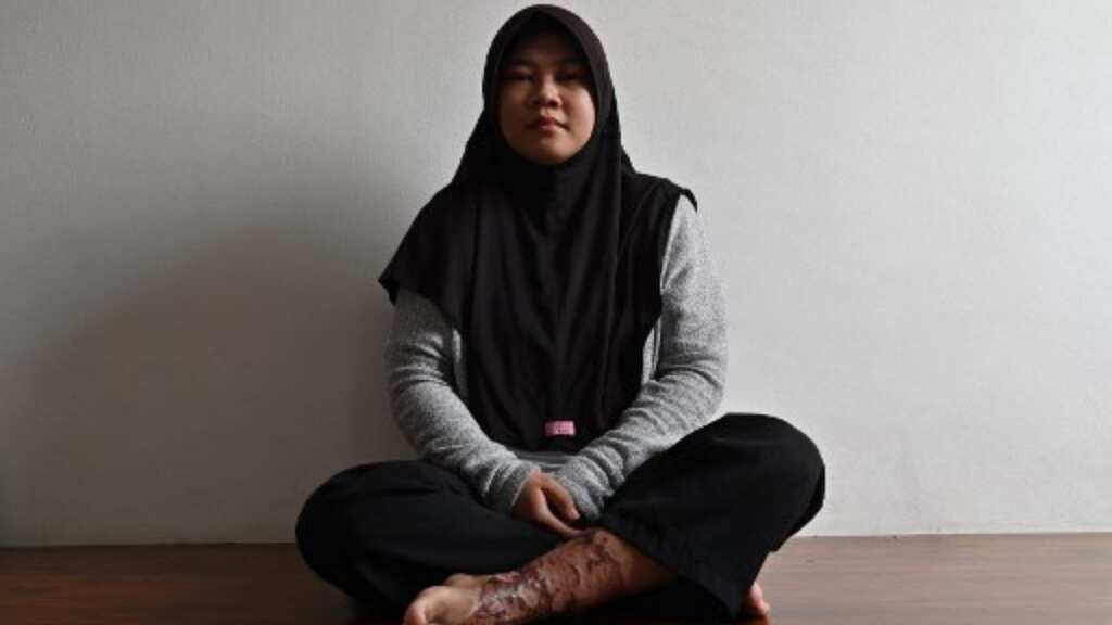Woman beaten, chained to dog cage and forced to eat animal faeces by employer in Indonesia