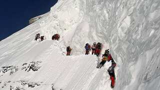 Record-breaking mountaineer refutes reports of climbing over porter's dead body to scale K2