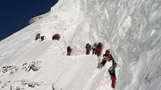 Record-breaking mountaineer refutes reports of climbing over porter's dead body to scale K2