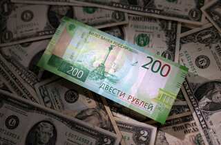 Russia raises interest rate to 12% as sliding ruble bites hard