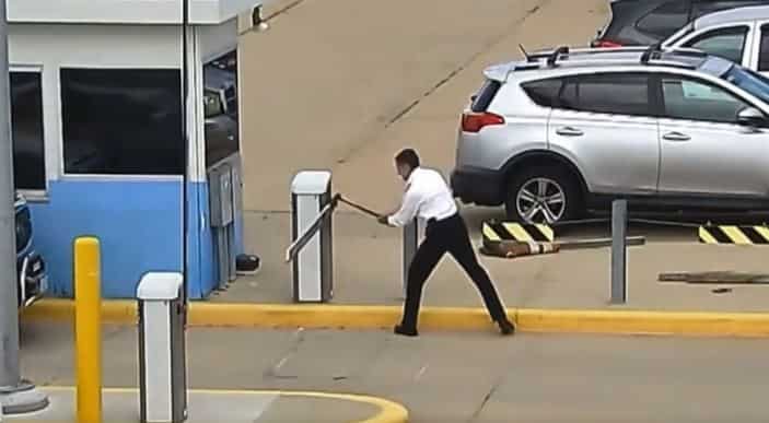 Watch: Pilot attacks parking gate with axe 20 times at Denver Airport after ‘hitting breaking point’