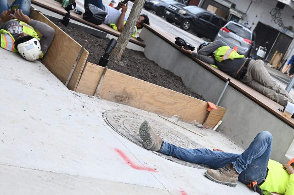 Outdoor workers face the heat, quite literally