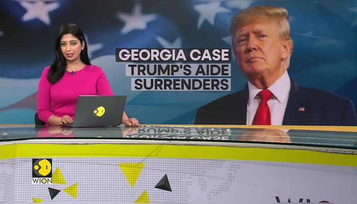 First Trump allies in presidential election subversion case surrender in Georgia