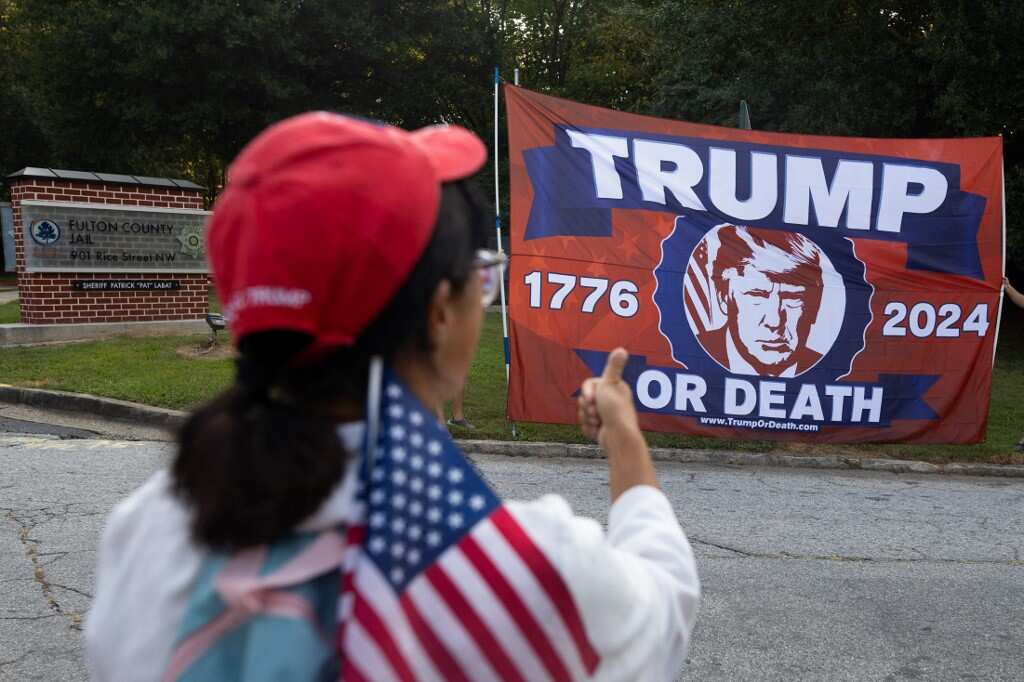 Donald Trump replaces his top lawyer hours before planned surrender in election subversion case