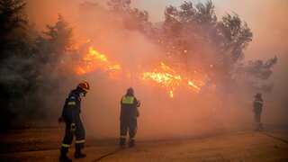 Greece wildfires closing in on Athens, EU pitches in with help to tame the blazes