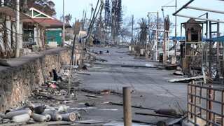 Hawaiian Electric says power lines were shut hours before fire broke out
