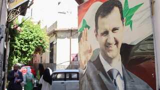 Syria's Assad's ruling party shut by protests in rebellious Druze city