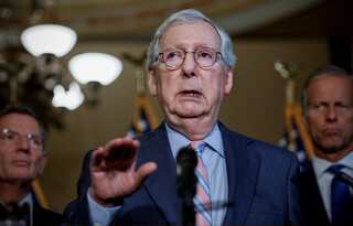 McConnell shrugs off health worries in Senate return after August recess