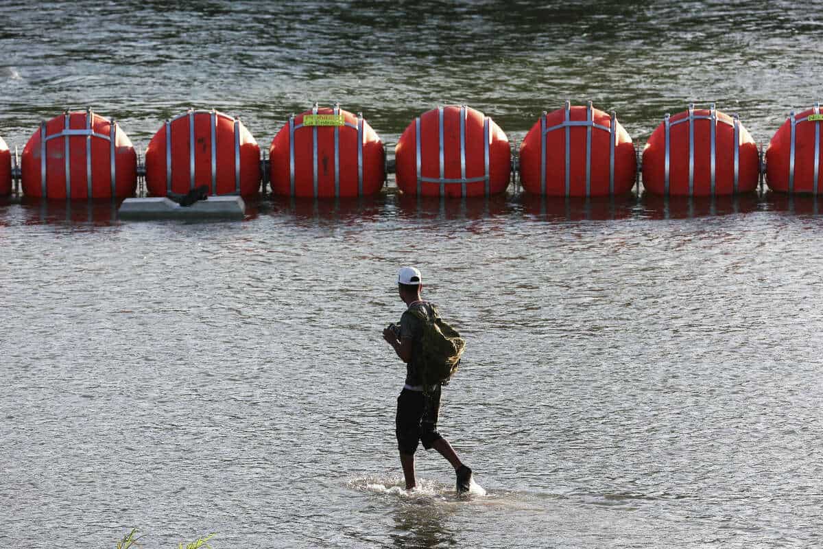 Court orders Texas to remove floating buoys on Rio Grande in major win for Biden admin Court orders Texas to remove floating buoys on Rio Grande in major win for Biden admin