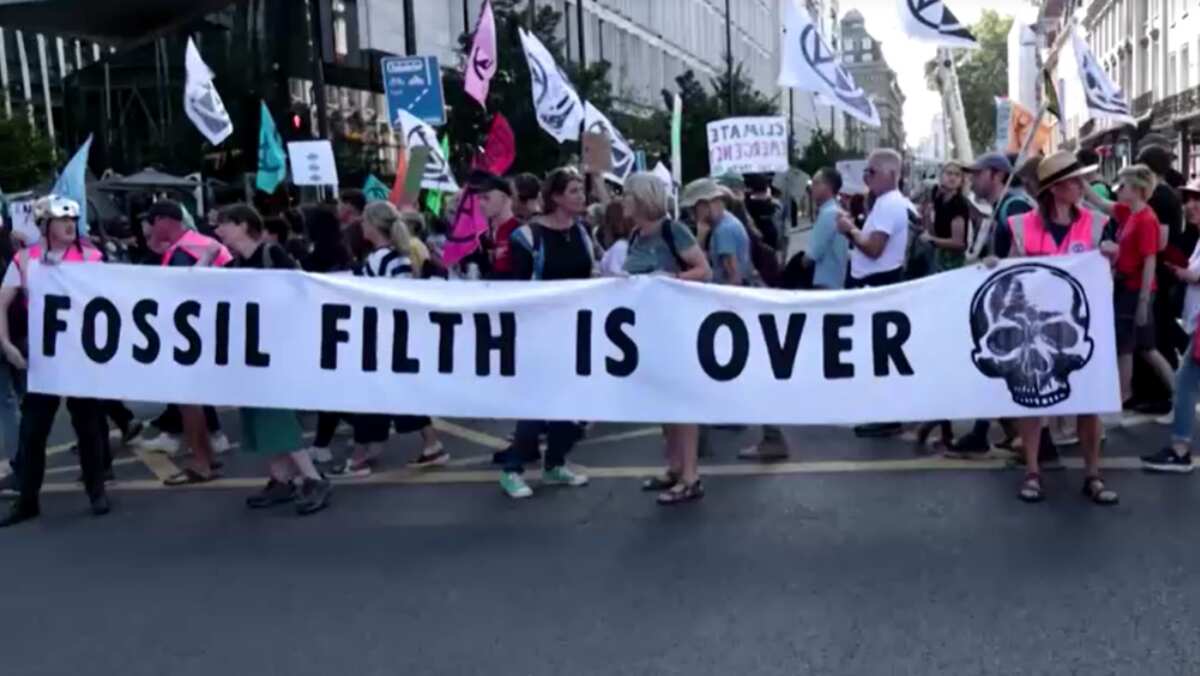 'Fossil filth is over' banners