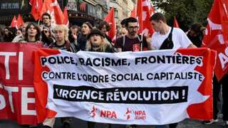 Violence breaks out at protest as people attack police car in Paris; three arrested