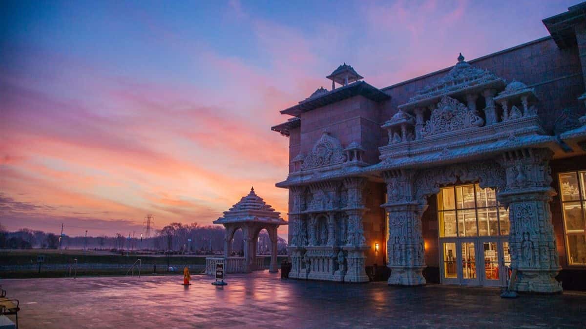 Who is behind the temple?