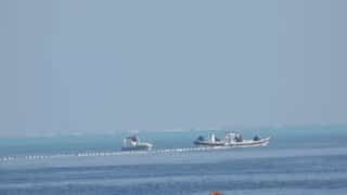 Philippines removes Chinese ‘floating barrier’ in South China Sea after ‘special operation’
