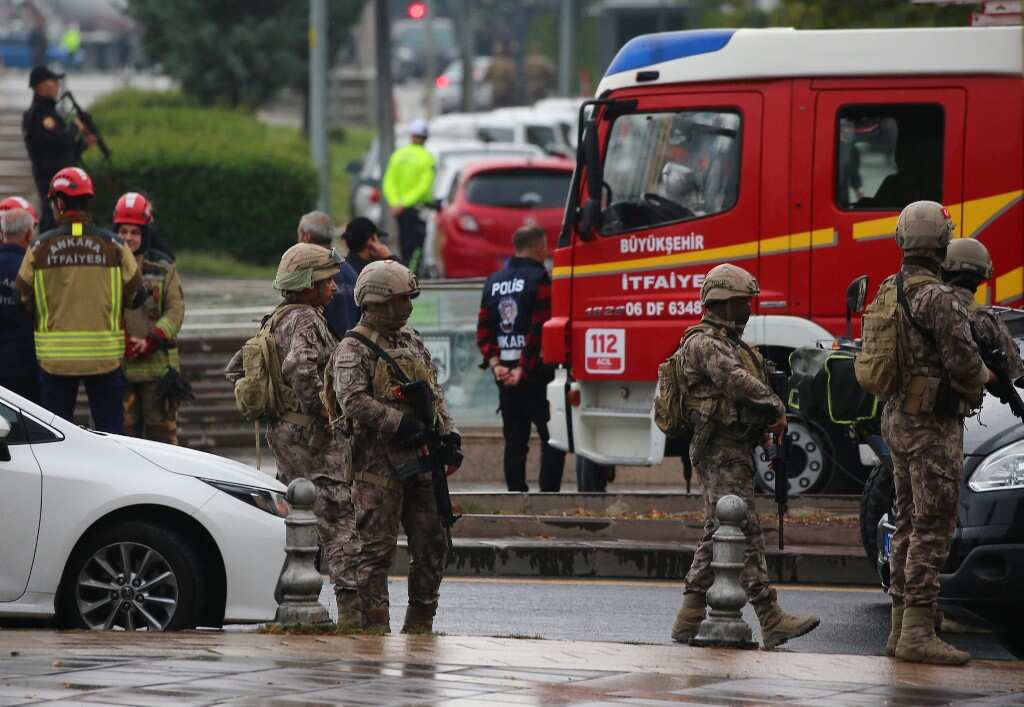 Suicide bomber triggers blast near Turkish parliament, another shot; 2 officers injured