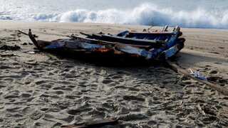 Migrant boat, with personal items strewn across, washes ashore in Israel
