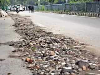 India: Local MLA's aide digs up newly-made road in UP as contractor refuses to pay 'goonda tax'