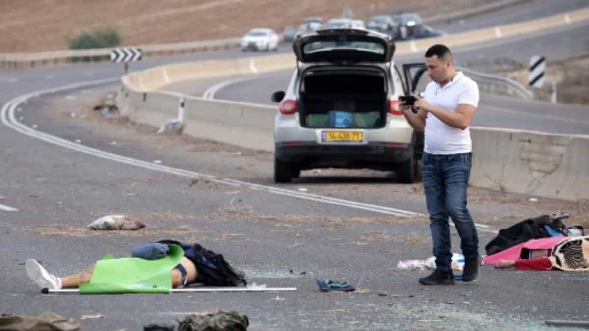 Man takes picture of body