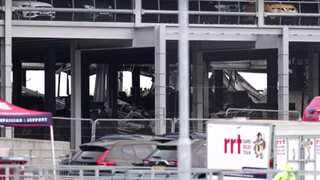 London's Luton Airport suspends flights after massive fire breaks out in parking lot