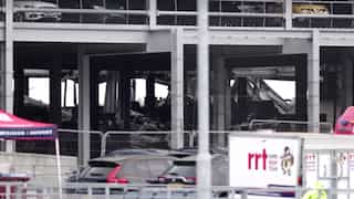 London's Luton Airport suspends flights after massive fire breaks out in parking lot